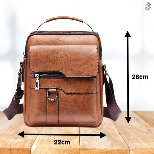 A man reaching into the Caleb shoulder bag, illustrating the ease of access to his essential belongings.