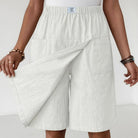 Back view of the black Lysandra skort shorts, highlighting the comfortable elastic waistband and fit.