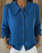 Front view of the Maeve classic button-up cardigan in blue, showcasing its loose fit and smooth knit.