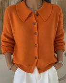 Close-up of the smooth knit texture and classic collar of the Maeve button-up cardigan.