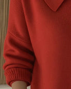 Detail shot of the button closure and hem finish on the Maeve classic button-up cardigan.
