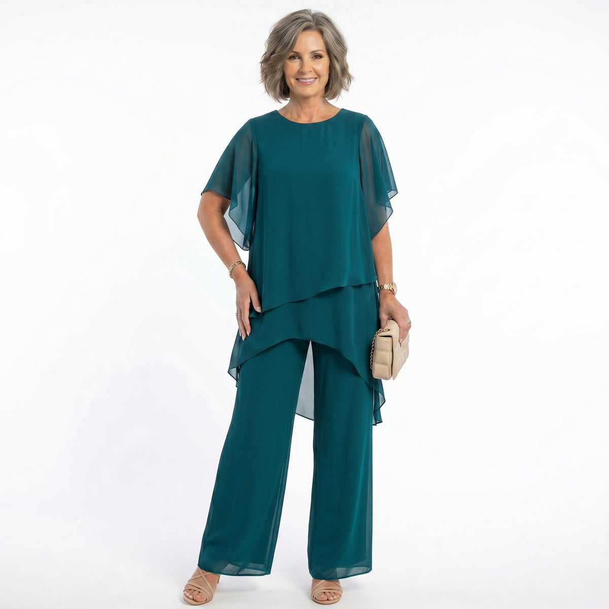 A lavender blouse displayed flat, clearly showing the short sleeves and delicate tiered construction.