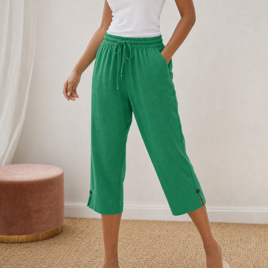White trousers in an outdoor setting, demonstrating their opacity and light-reflecting quality.