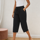 Lifestyle image of a woman enjoying a relaxed day, perfectly dressed in her comfortable summer trousers.
