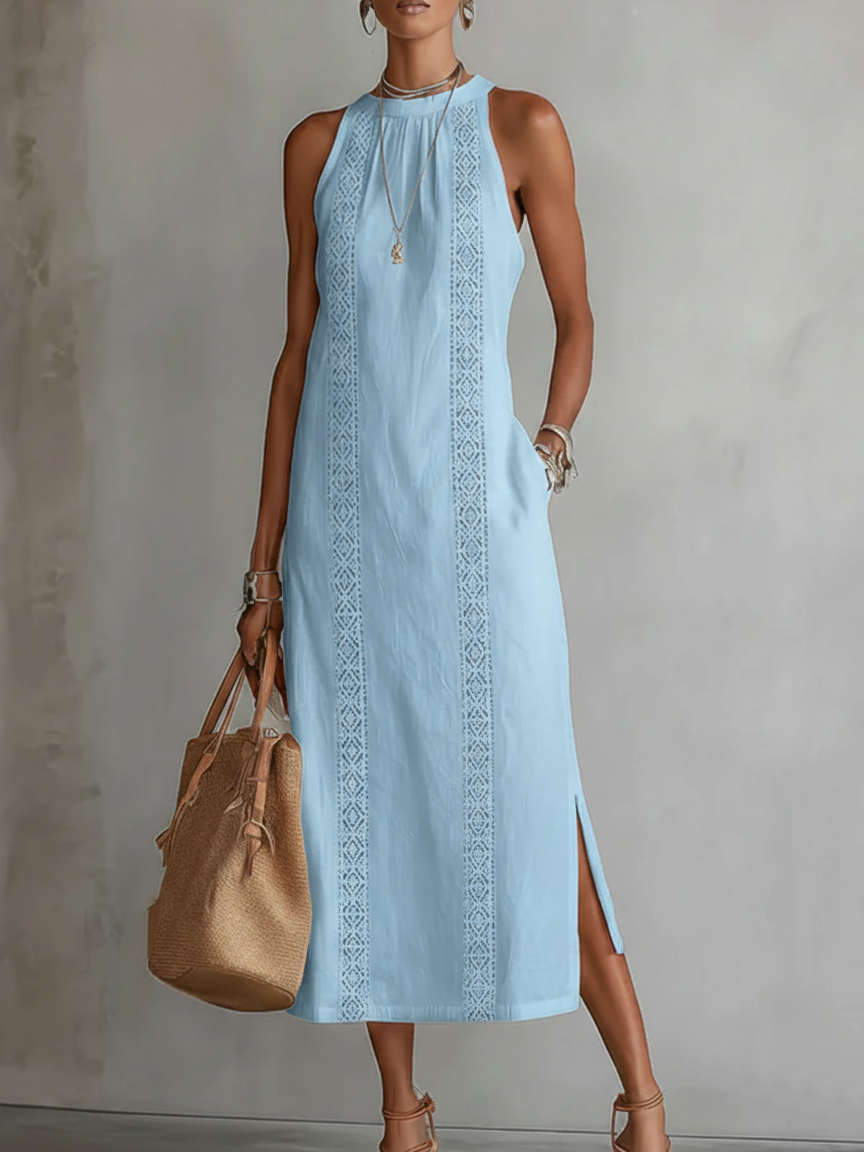 Model walking in the white breathable midi dress, capturing the garment's movement and comfort.