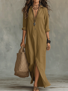 Lifestyle image of a khaki long sleeve maxi dress, ideal for an effortless everyday style.