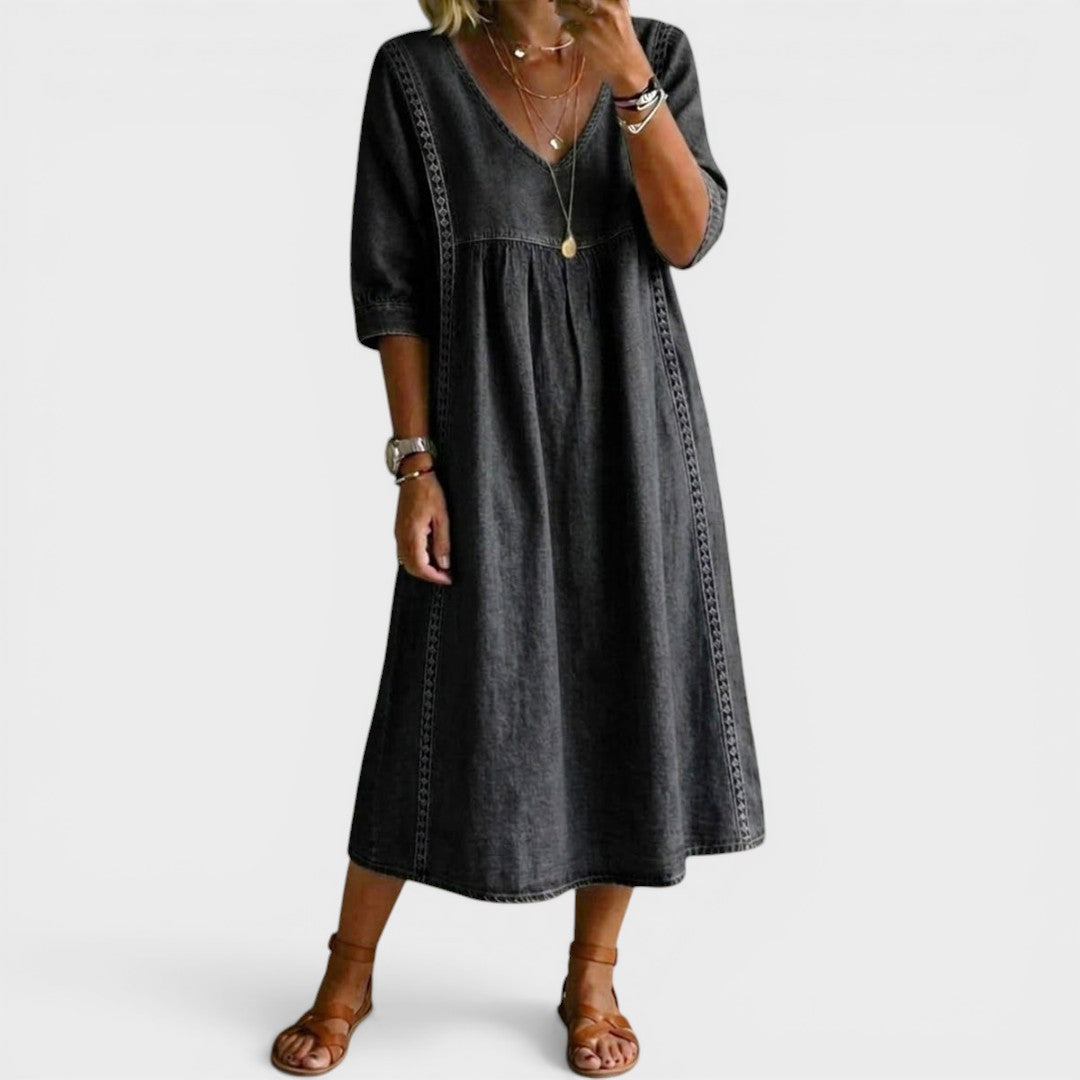 Back view of the Romy denim jeans, emphasizing the comfortable fit and fabric drape.