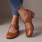 A model wearing tan Mary Jane shoes, showcasing their polished look and comfortable design for versatile everyday occasions.