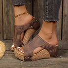 Close-up of the side profile of the Solange studded wedge sandals, highlighting the comfortable cushioned insole.