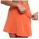 Casual outdoor scene with a model wearing the light gray skort, ideal for a comfortable day out.
