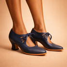 Close-up of the delicate lace-up detailing on the front of the Talia leather lace heels.