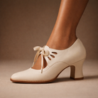 Woman wearing Talia elegant leather lace heels in blue, walking confidently.